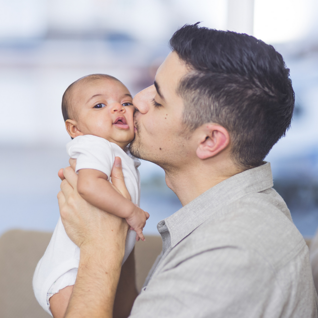 Dad bonding with babies 