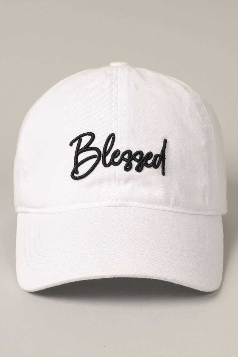 White, "Blessed" lettering, 6 panel design, pre-curved visor, comfortable fit, 100% washed cotton, adjustable metal strap