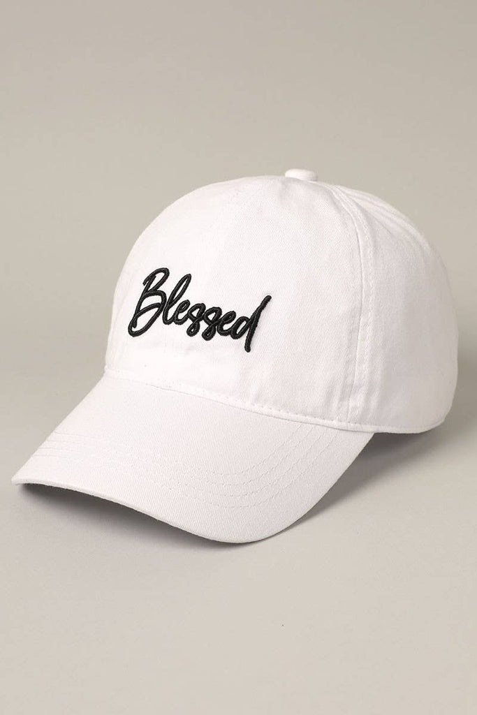 White, "Blessed" lettering, 6 panel design, pre-curved visor, comfortable fit, 100% washed cotton, adjustable metal strap, side view